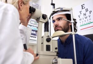 Patient receiving an eye exam to check for diabetes-related vision changes.